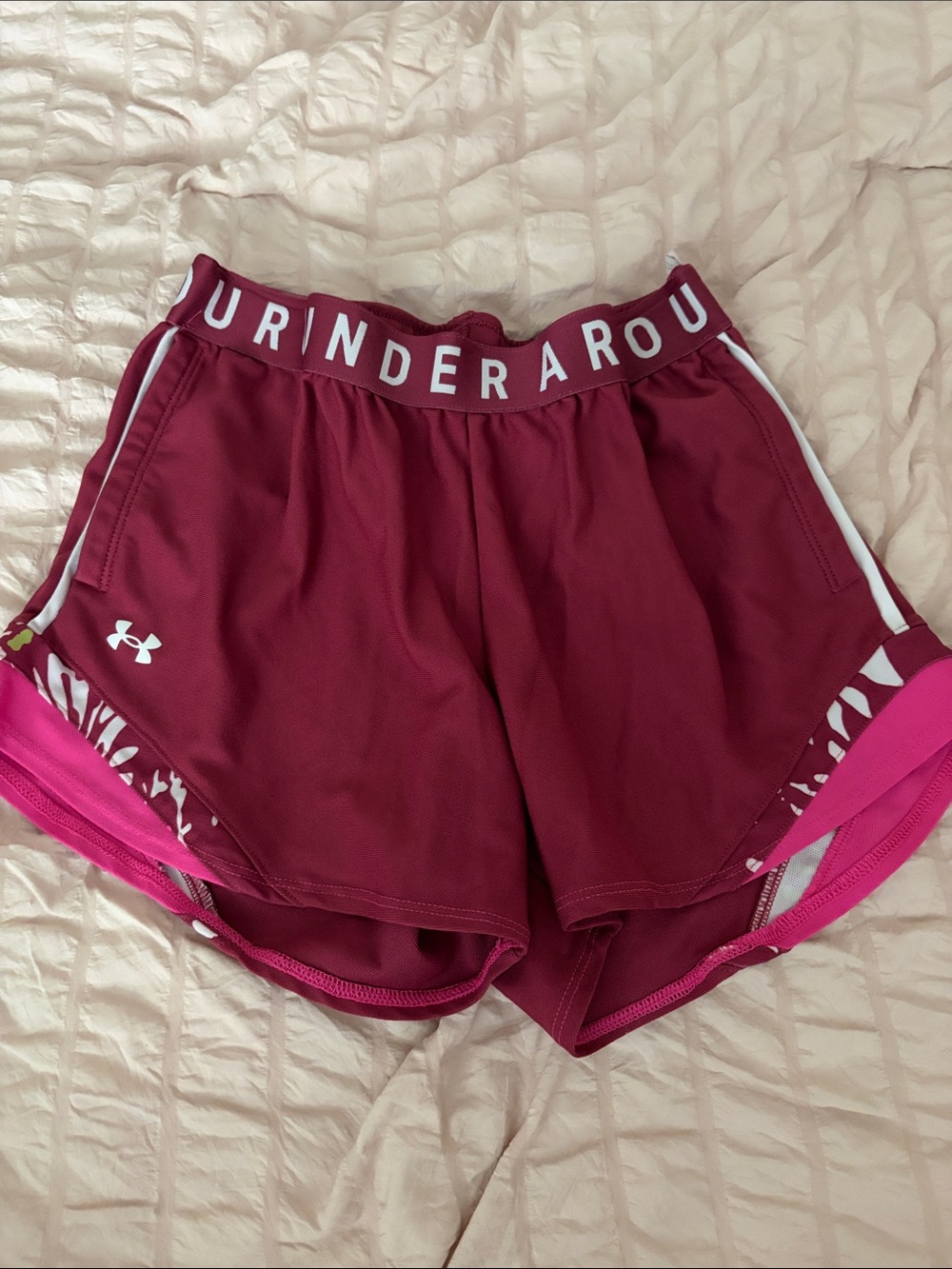 Under Armour Women's dark pink Athletic Shorts with Pink Accents